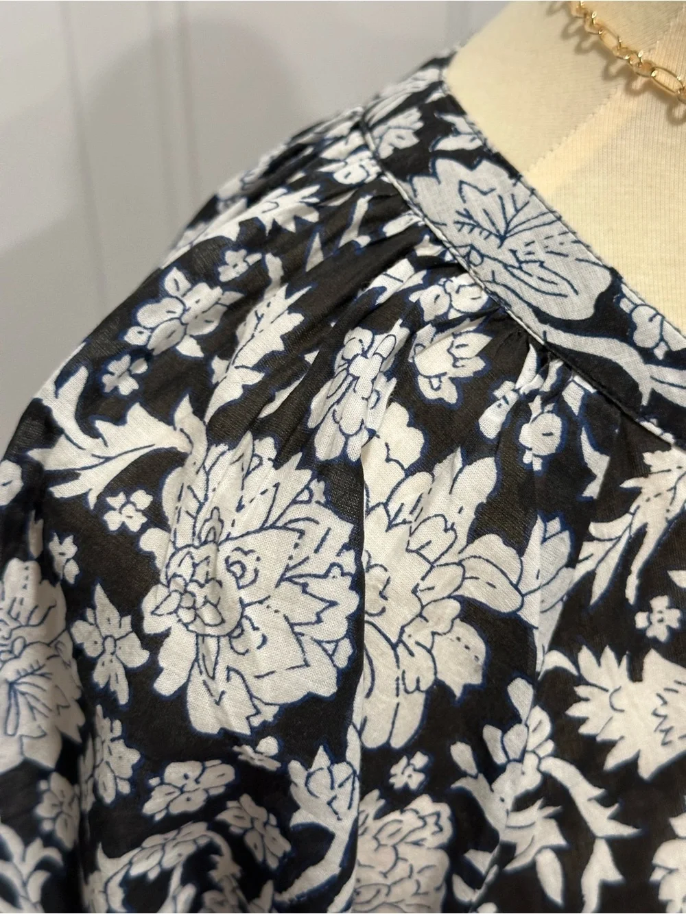 Anthropologie Black and White Floral Puff-Sleeve Top with Blue Trim